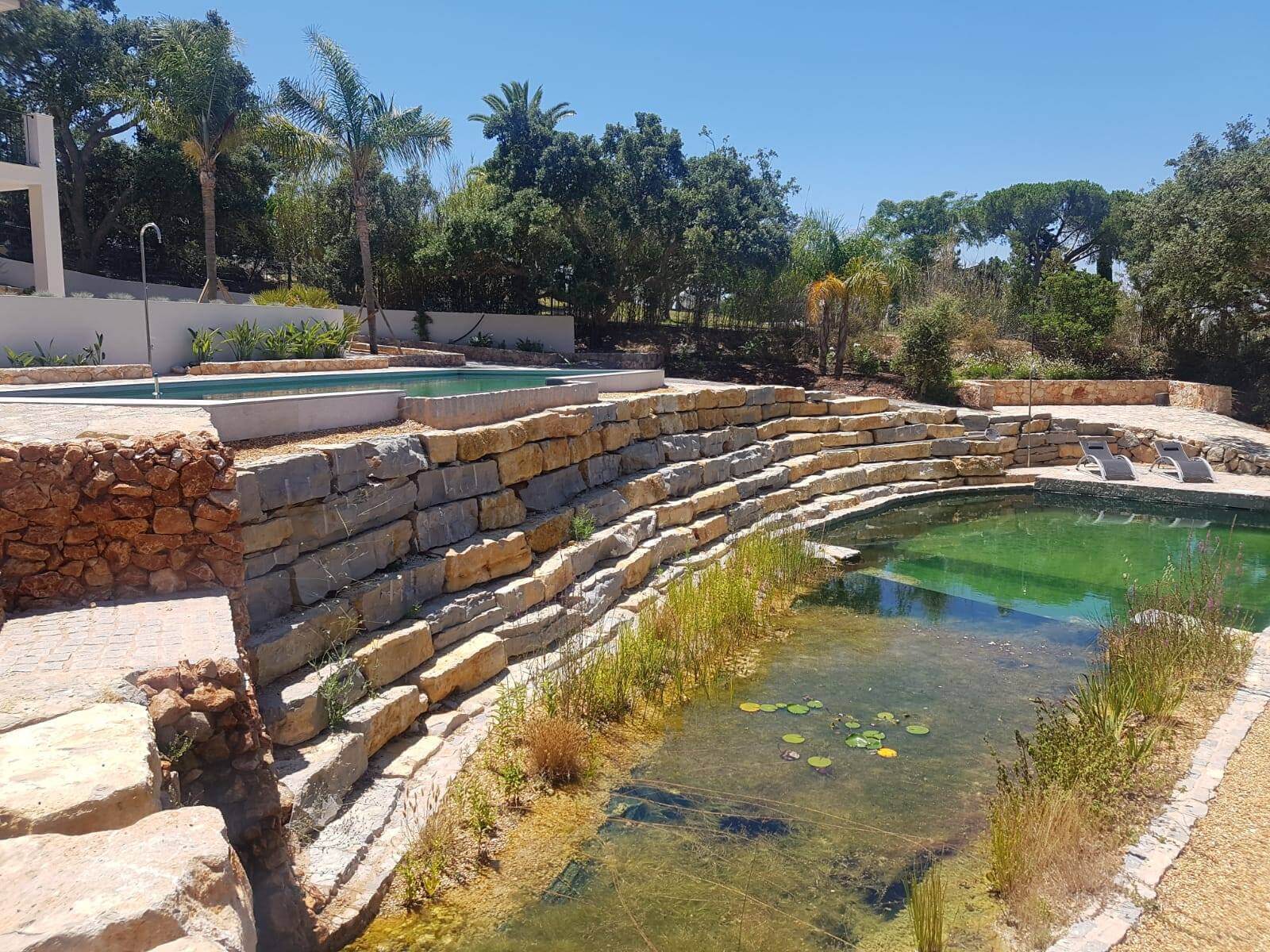 Water Saving Stone Garden Including A Swimming Pond Landscaping And Garden Maintenance Vital Gardens